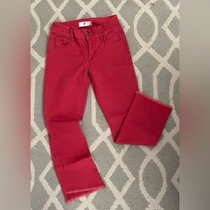 Cropped, muted red stretch jean